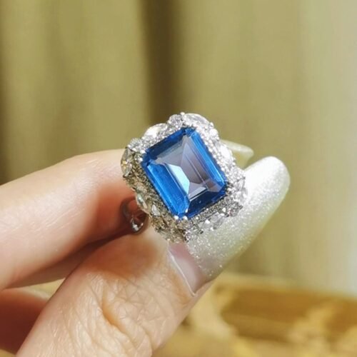 emerald-cut-blue-topaz-cocktail-ring Blue Topaz Cocktail Ring Emerald Cut Affordable Luxury