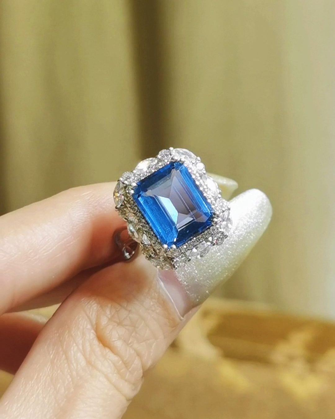Blue Topaz Cocktail Ring Emerald Cut Affordable Luxury